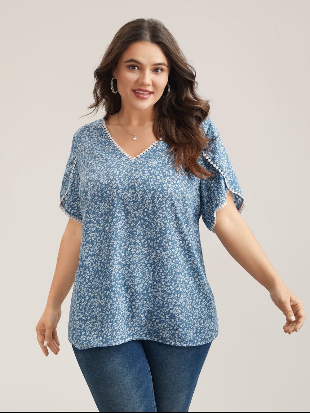 BloomChic Blue Floral V‑Neck Tunic with Pom Trim